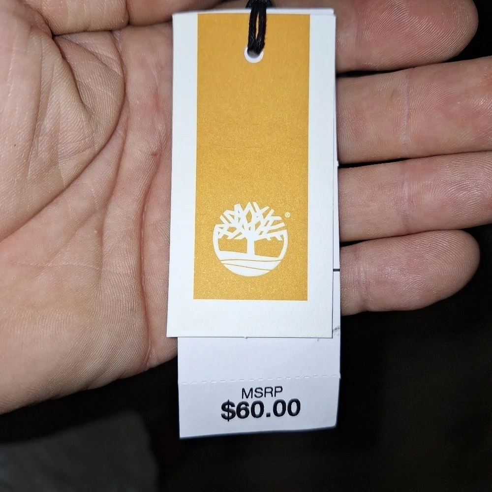 A Timberland white/ lt. brown plaid scarf that's 67